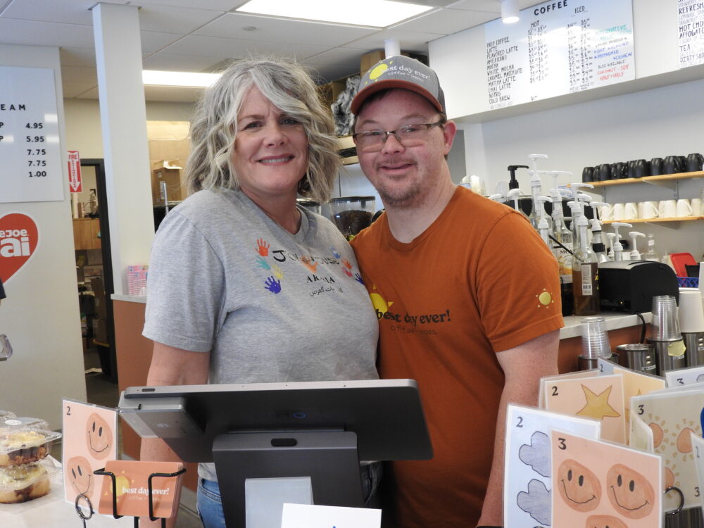 Seth and his mom, Marla, behind the counter at Best Day Ever! Café in Longmont